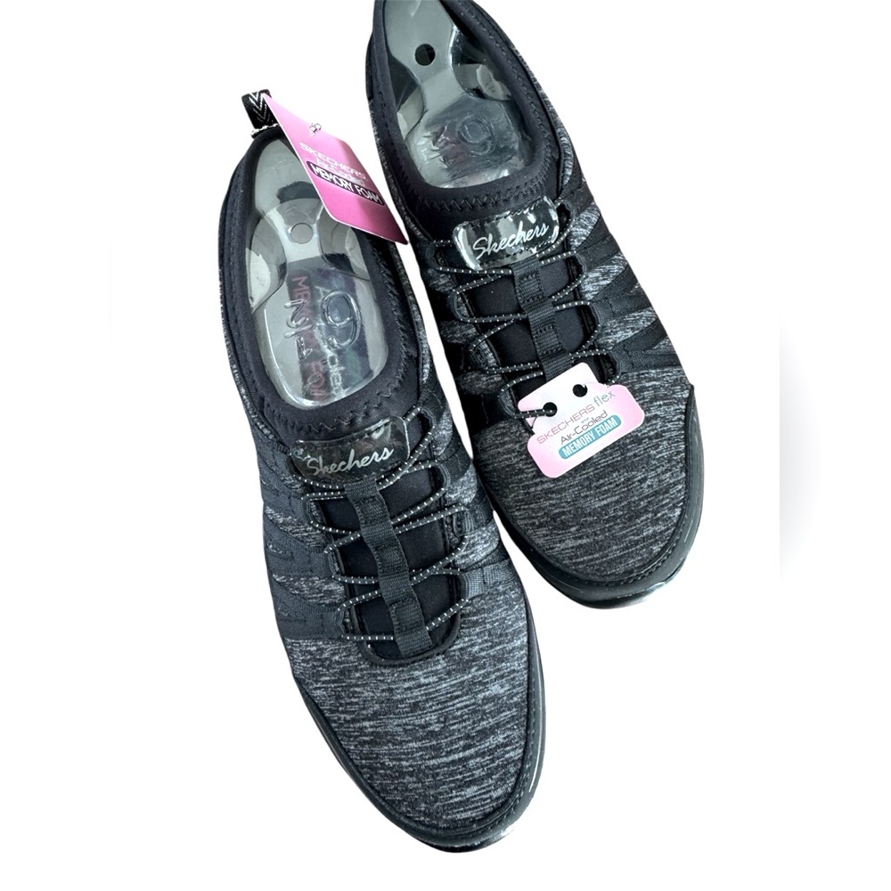 Skechers woman’s slip in sneaker shoe, black & grey upper, size 6.5. Never worn!